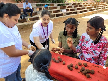 Seed-ball making with school children